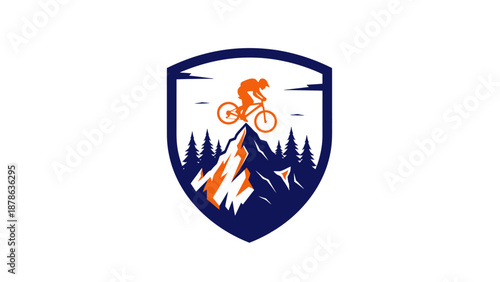 Dynamic logo featuring a mountain biker performing a jump over a rocky peak, set against a backdrop of pine trees and a shield emblem.
