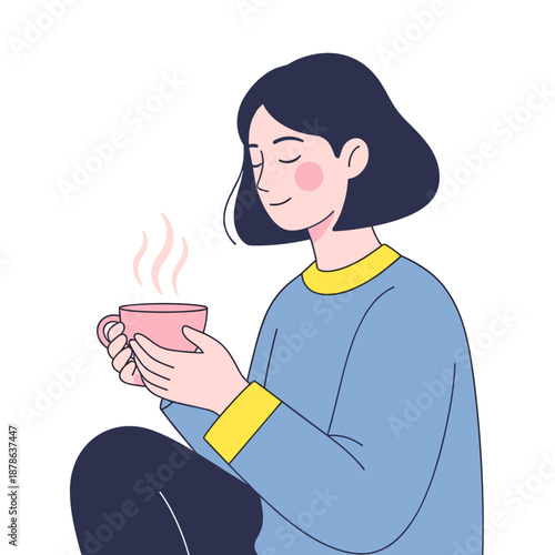 Young woman enjoying warm drink with closed eyes in cozy atmosphere  