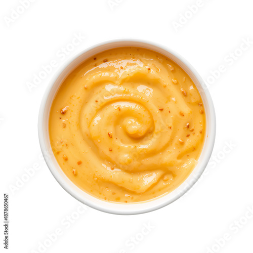 Creamy Orange Dip With Chopped Herbs Served in a White Bowl on a Plain Backgr...