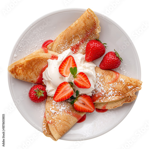 Strawberry Crepes Served With Whipped Cream on a White Plate at Breakfast