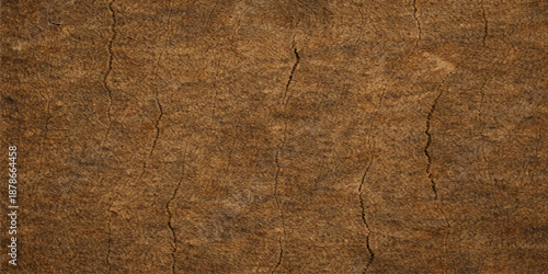 A textured old wood background featuring a brown grunge wooden surface with a rough aged timber plank pattern and natural antique material structure