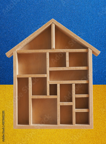 Haussymbol mit gelb, blauen Hintergrund