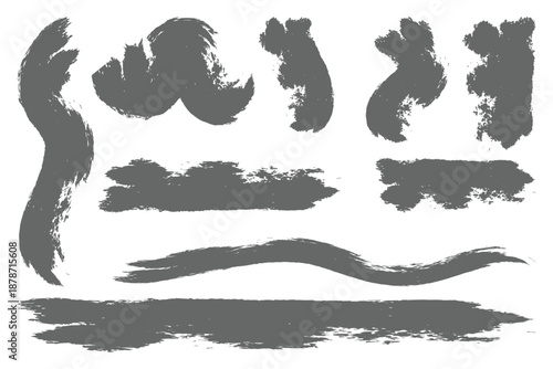 Collection of expressive grey hand drawn ink brush strokes and painterly textures on white