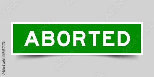 Canvastavla Green color square shape sticker label with word aborted on gray background