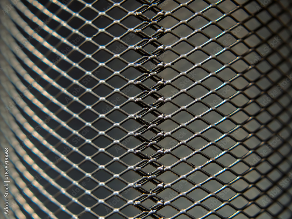 Fototapeta premium Metal Mesh Pattern Close-Up for Industrial Applications