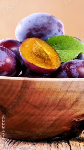 fresh plum and leaf, vertical video for social media