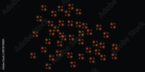 A blurry image of numerous small colorful lights on a black background