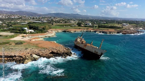 Abandoned Edro III Shipwreck at seashore of Peyia, near Paphos, Cyprus. Historic Edro III Shipwreck site on the shore of the water in Cyprus. Aerial view of Shipwreck EDRO III, Pegeia, Paphos.