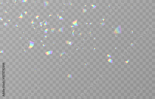 Falling holographic confetti. Shiny rainbow confetti PNG. Falling streamers or tinsel on an isolated transparent background.