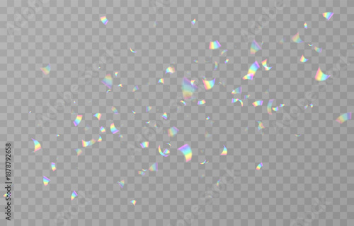Falling holographic confetti. Shiny rainbow confetti PNG. Falling streamers or tinsel on an isolated transparent background.
