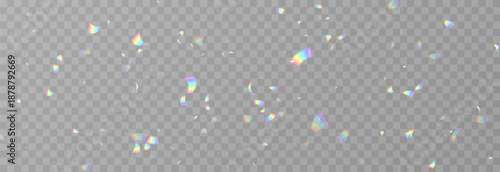 Falling holographic confetti. Shiny rainbow confetti PNG. Falling streamers or tinsel on an isolated transparent background.