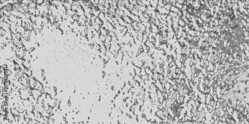 Grayscale abstract texture with a mottled, organic pattern resembling distressed paper or a rough, textured surface with dark outlines