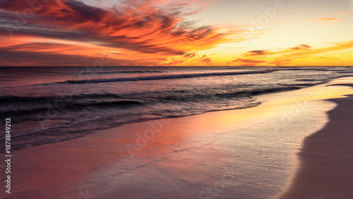 Soft Waves with a Warm Dramatic Sunset