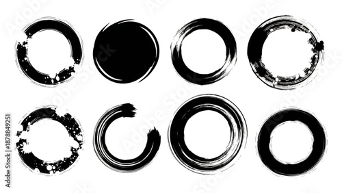 Collection of diverse black and white circular frames and brushes viewed directly