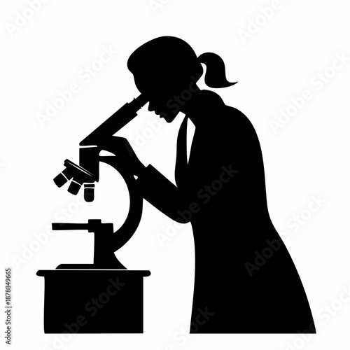 Silhouette of a scientist using a microscope for research and analysis process in laboratory