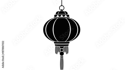 Traditional black Chinese lantern with tassel decoration on isolated white background