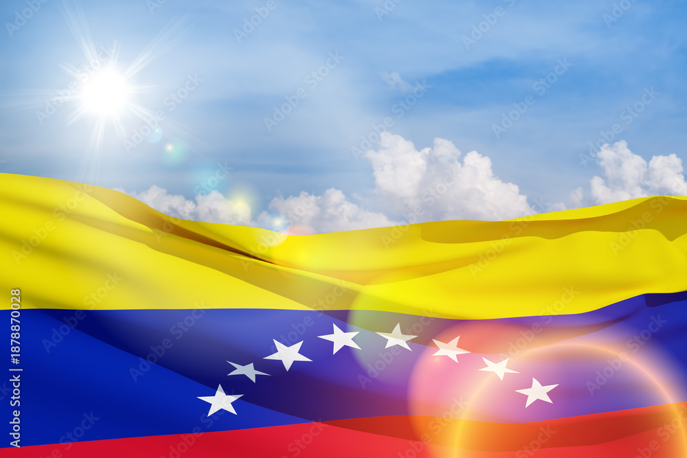 Fototapeta premium Venezuela flag on background of blue sky. Patriotic concept. Banner with place for text.