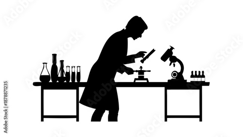 Silhouette of a scientist looking through a microscope, laboratory glassware and test tubes on the table, research and development concept.