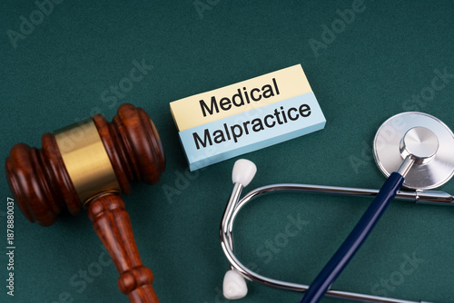 High angle view of gavel and stethoscope Medical Malpractice concept