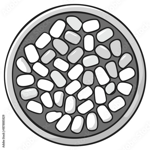 Top-down view of a ceramic bowl filled with assorted oval-shaped candies.