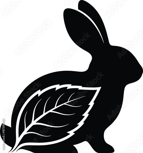 Black Rabbit Silhouette with Internal Leaf Detail Symbolizing Nature. Vector illustration