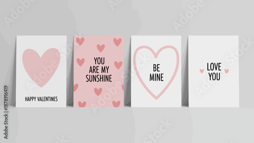 Valentines greeting cards with pink hearts and loving messages displayed together on a shelf