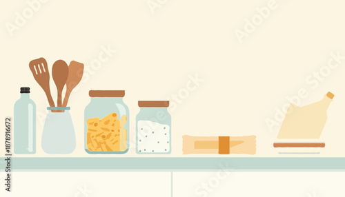 Zero-waste kitchen with glass containers, reusable bottle and wooden utensils