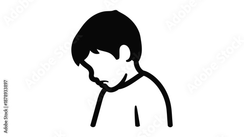 A contemplative figure with head bowed a striking black silhouette