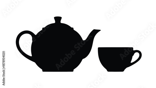 Black teapot and teacup presented as a striking dark silhouette