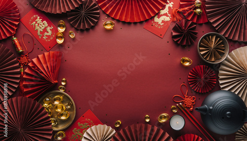 Wallpaper Mural Aerial view of a festive Chinese New Year backdrop with red and gold decorations, fans, and a teapot on a red surface Torontodigital.ca