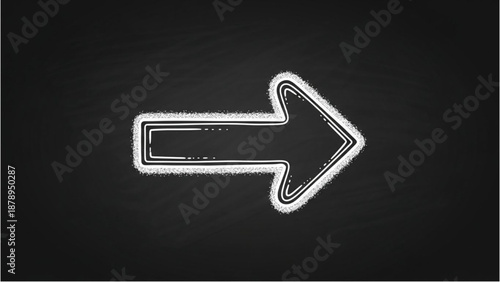 A sleek arrow icon on a dark background is viewed from directly above indicating direction or navigation.