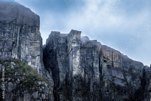 Preikestolen (Pulpit Rock) Cliffs Rising Above Lysefjord, Norway under a dramatic sky