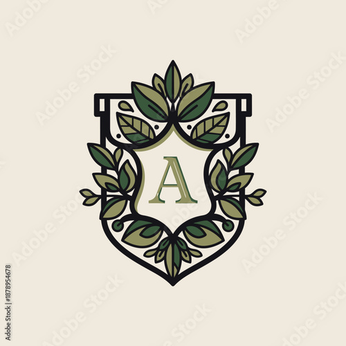 Elegant Emblem with Letter A and Green Leaves.