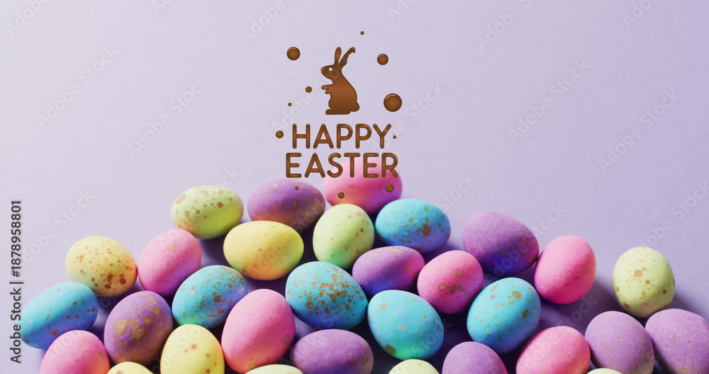 Obraz premium Image of happy easter text over colourful easter eggs on purple background