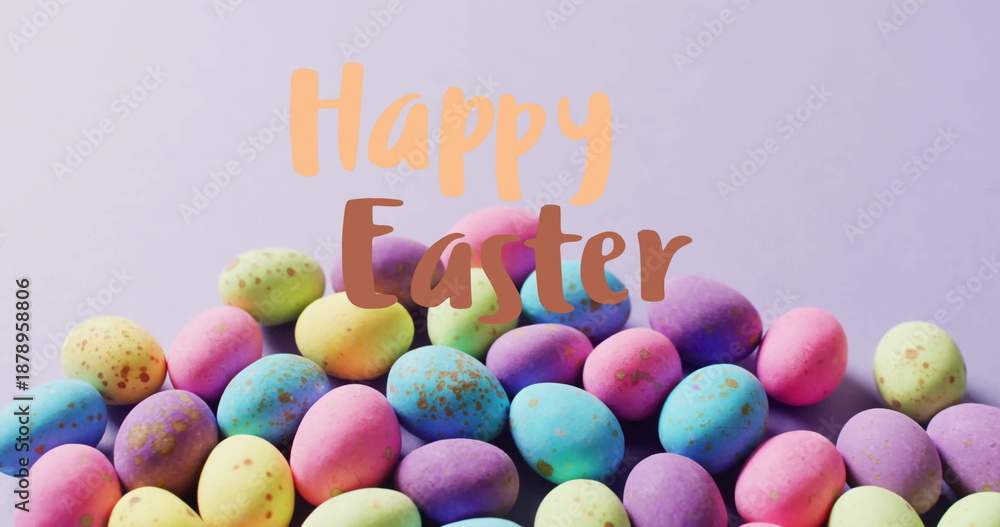 Naklejka premium Image of happy easter text over colourful easter eggs on purple background