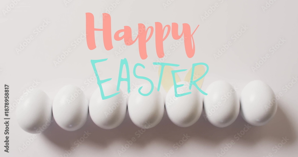 Fototapeta premium Image of happy easter text over white easter eggs on white background