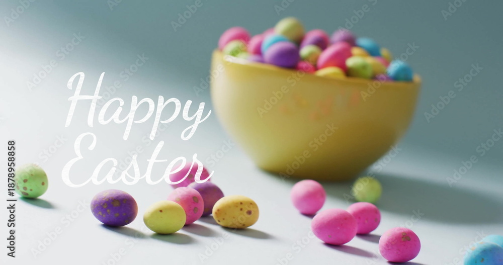 Obraz premium Image of happy easter text over colourful easter eggs in bowl on blue background