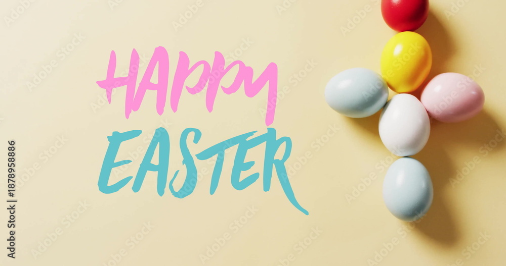 Fototapeta premium Image of happy easter text over colourful easter eggs on yellow background