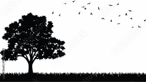 Silhouette of a tree with birds flying away in the sky
