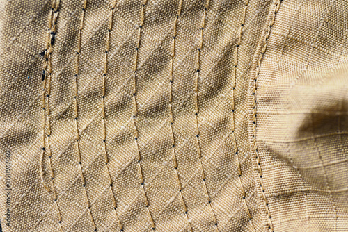 Tableau sur toile Macro view of tan ripstop textile showing detailed weave and multiple parallel r
