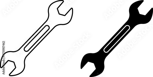 Two adjustable wrenches in black and white for repair and maintenance work