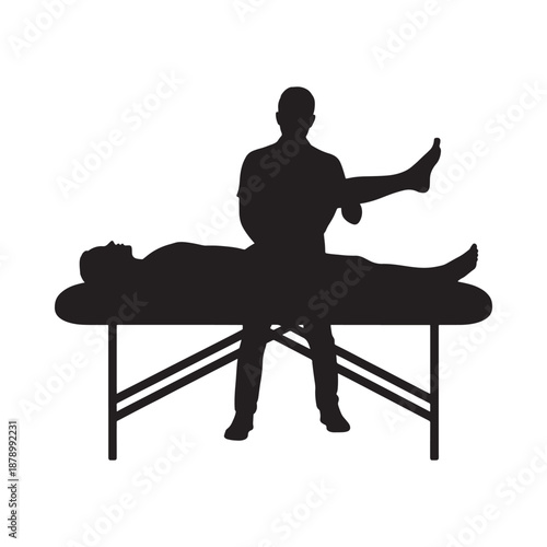Silhouette of a physical therapist working with a patient on a table