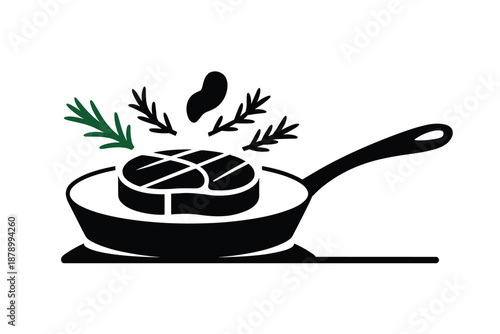 Sizzling Steak in Pan with Herbs, gourmet cooking concept