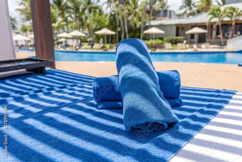 Konstfotografi Luxury blue towels by swimming pool at tropical hotel resort, summer vacation ba