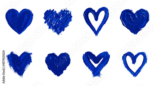 Blue paint heart set including solid, outline, scribbled, and textured brushstroke styles isolated. Romantic design element and artistic grunge symbol collection.