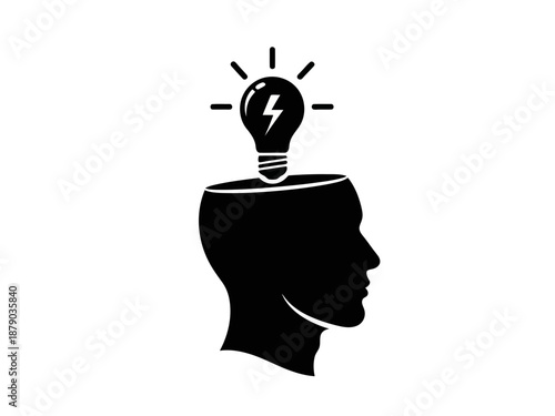 A black silhouette of a human head with a lightbulb and rays coming out of it
