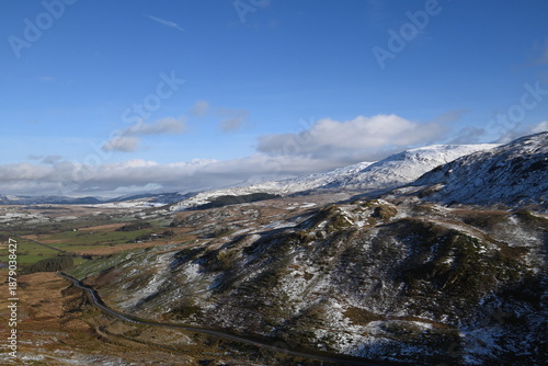a view walking up a snowy Cadair Idris in south Gwynedd, wales from the mach loop