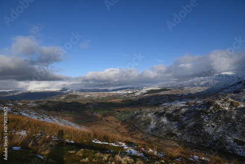 a view walking up a snowy Cadair Idris in south Gwynedd, wales from the mach loop
