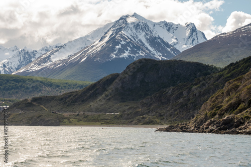 Beagle Channel, 'Playa Larga' beach and the spectacular snow-capped mountains of Ushuaia in Tierra del Fuego, Argentina