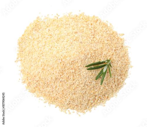 Canvas-taulu Pile of granulated dried garlic with rosemary isolated on white, top view